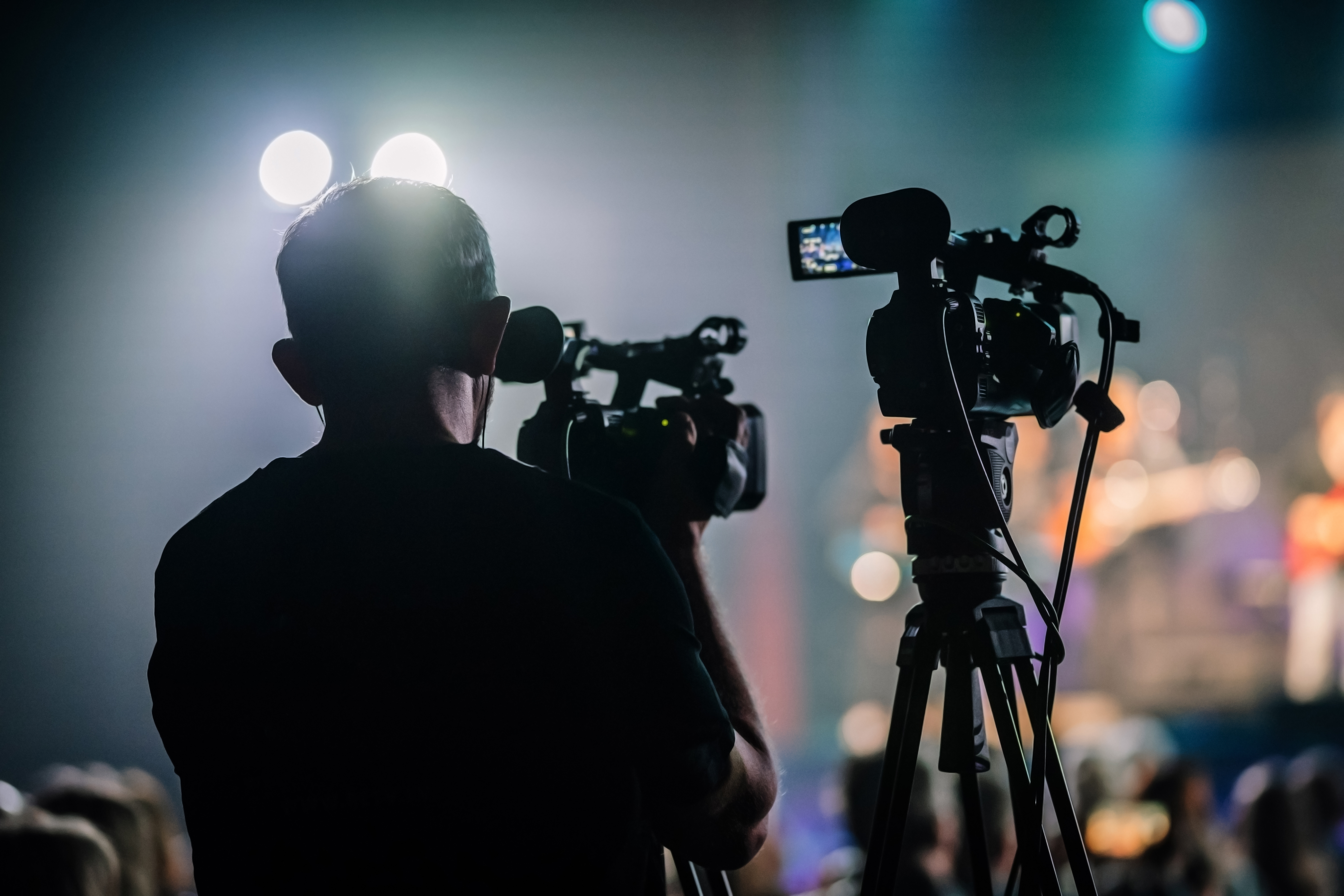 Professional,Digital,Video,Camera,Technician ,Videographer,With,Equipment,At,Event